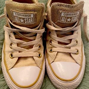 White and Gold Converse Sneakers.